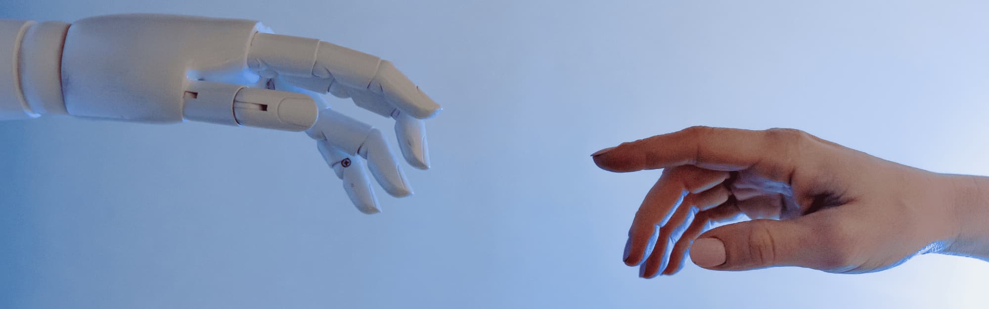 ai and human touching hands